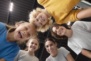 sports-teacher-with-her-students