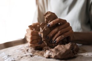 woman-clay-sculpting-side-view